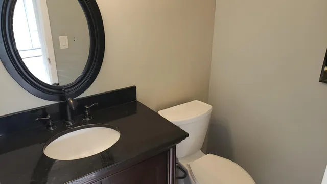 a view of a balcony with chairs