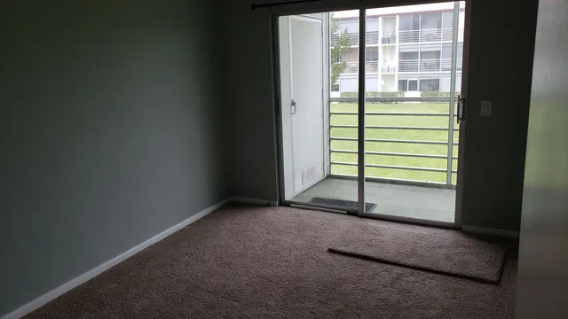 a view of a room with a window