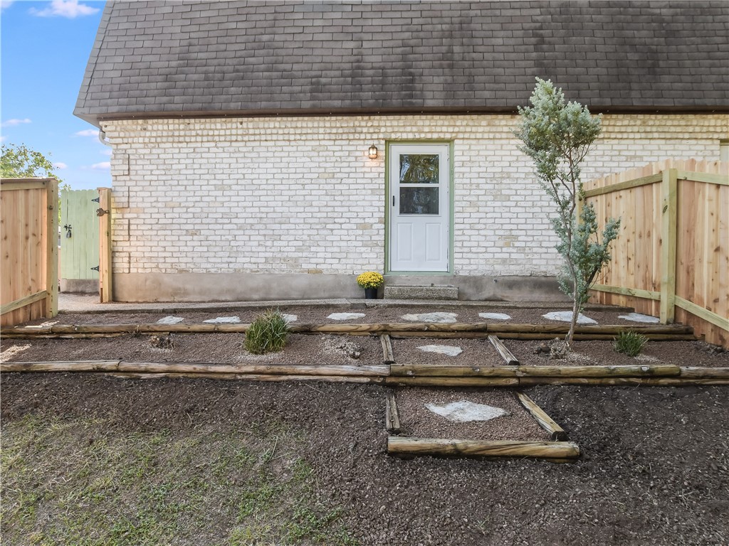 2804 Westhill Drive, Unit 101 Austin, TX 78704 - Photo 8 of 8 a front view of a house with a yard