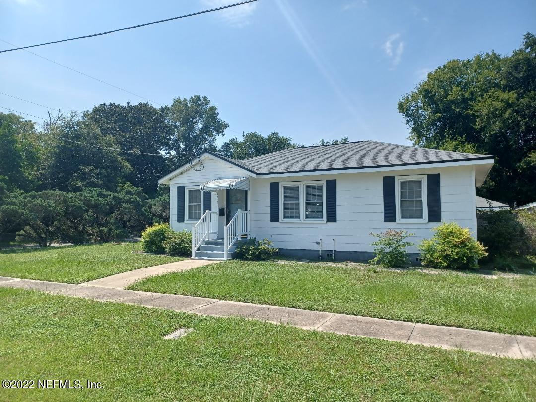 4808 Dundee Road Jacksonville, FL 32210 - Photo 1 of 7 a front view of a house with a yard