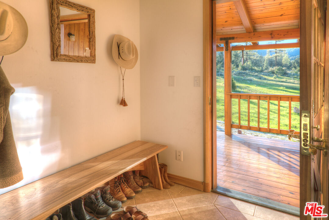 33224 Seymour Canyon Road Frazier Park, CA 93225 - Photo 12 of 32 a room with wooden floor and a window