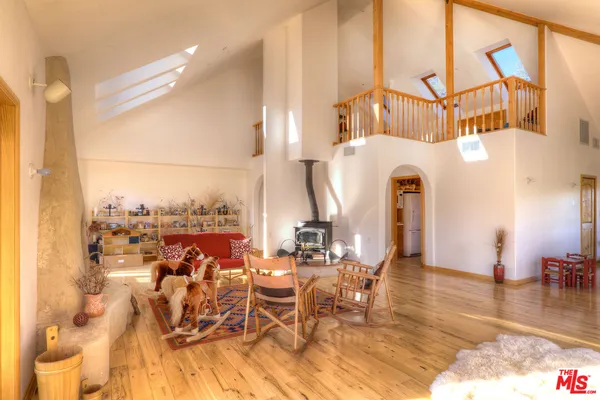 a view of a living room and entry way