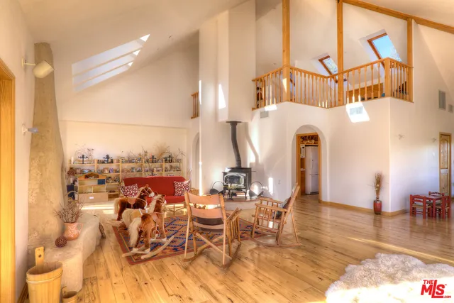 a view of a living room and entry way