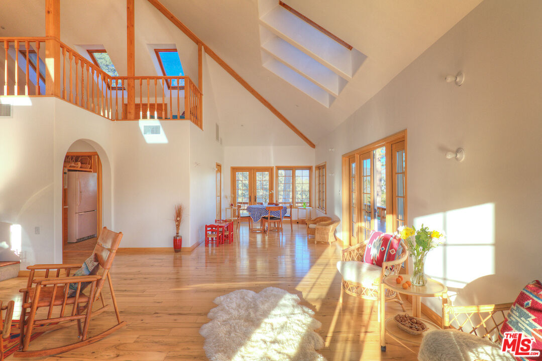 33224 Seymour Canyon Road Frazier Park, CA 93225 - Photo 6 of 32 a view of living room filled with furniture and floor to ceiling windows