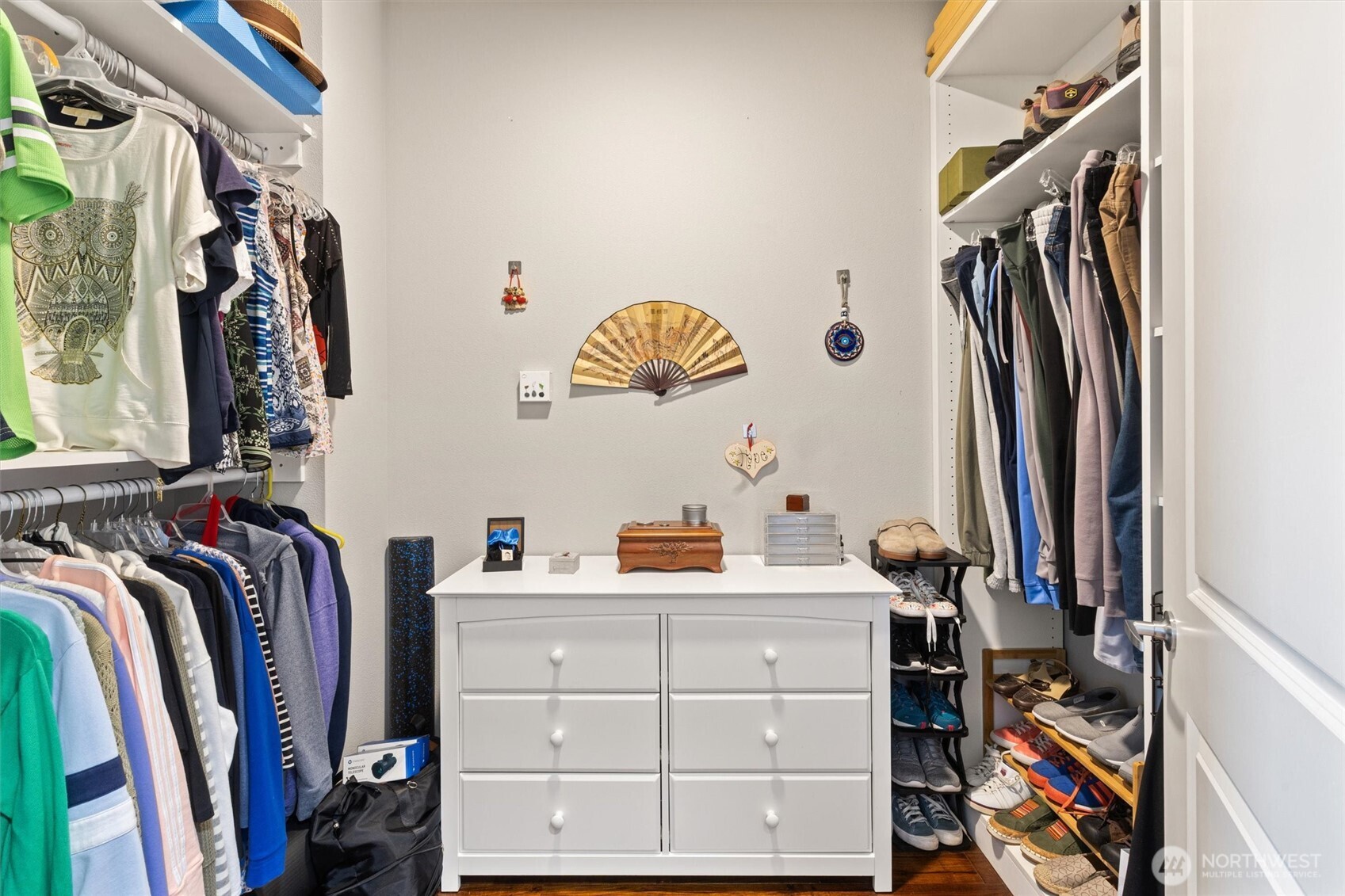 50 Pine Street, Unit 103 Edmonds, WA 98020 - Photo 19 of 40 a view of walk in closet with clothes and shoes