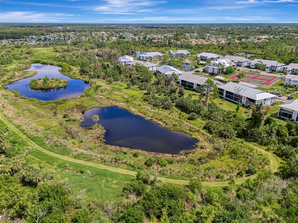 6800 Placida Road, Unit 146 Englewood, FL 34224 - Photo 53 of 64 a view of a lush green field
