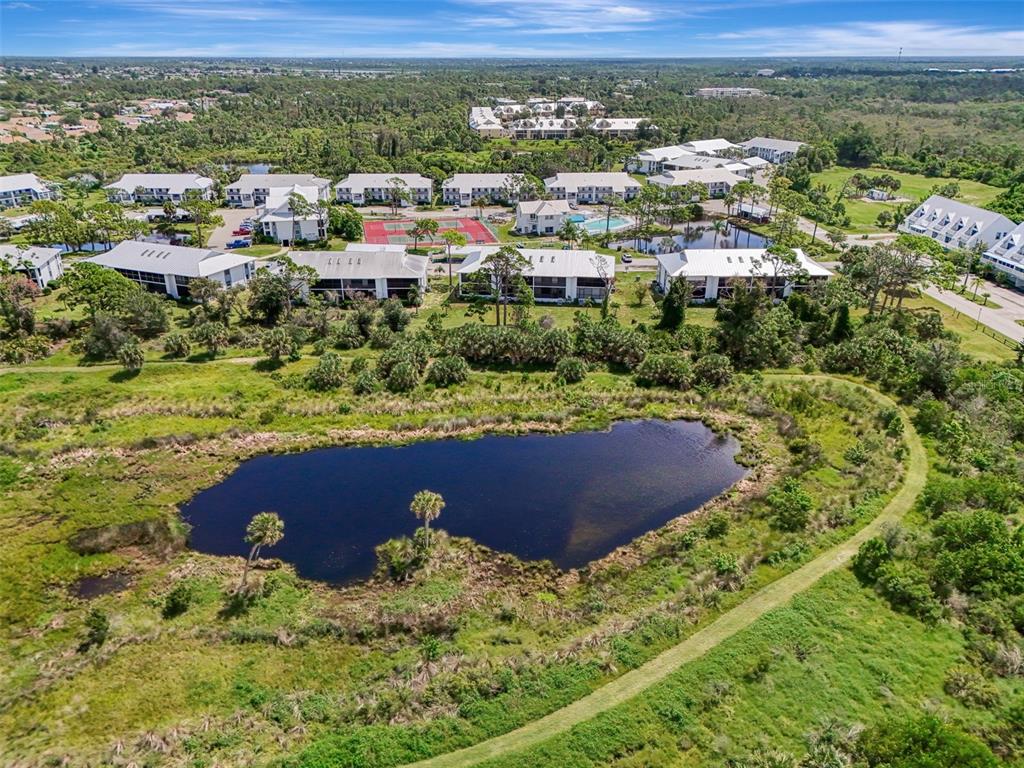 6800 Placida Road, Unit 146 Englewood, FL 34224 - Photo 54 of 64 a view of a yard with an outdoor space