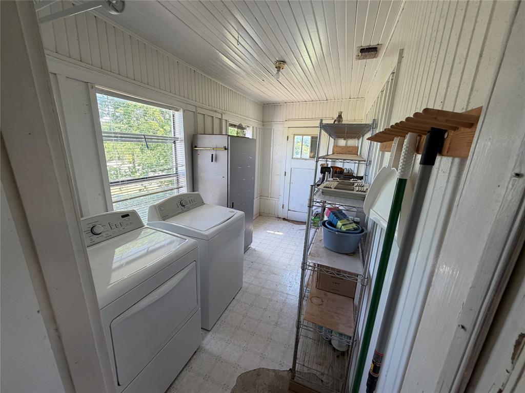 8041 Highway 11 Whitewright, TX 75491 - Photo 10 of 14 a room with storage and utility