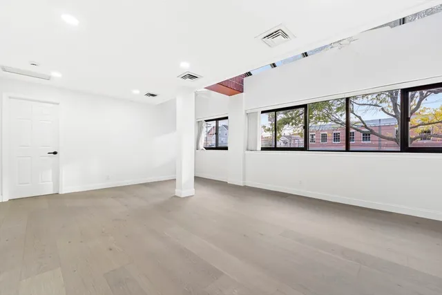 an empty room with windows