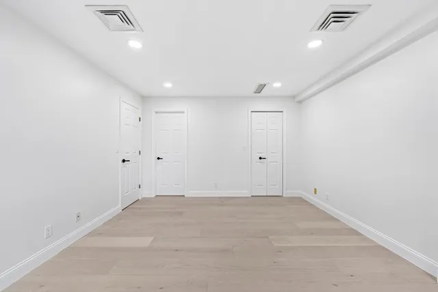 a view of a hallway with entryway