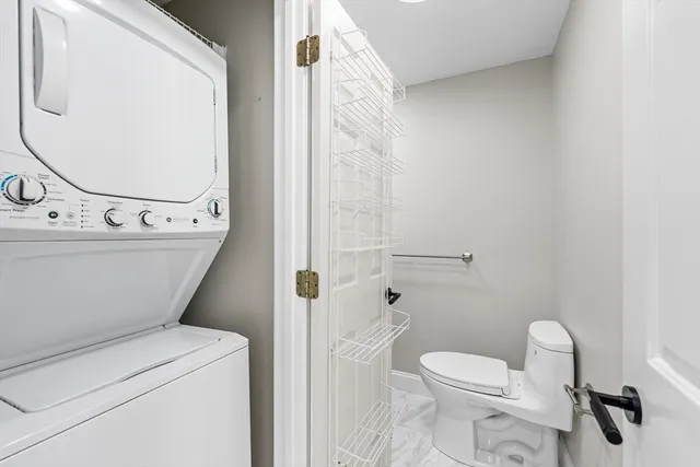 a view of a building with car parked