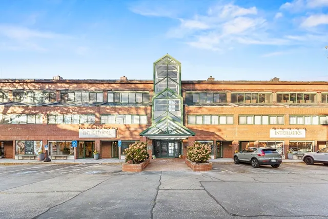 a view of a cars parked in front of a building