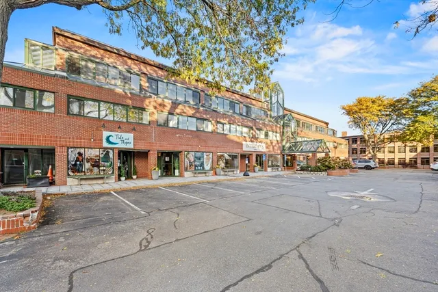 a view of a building with a street