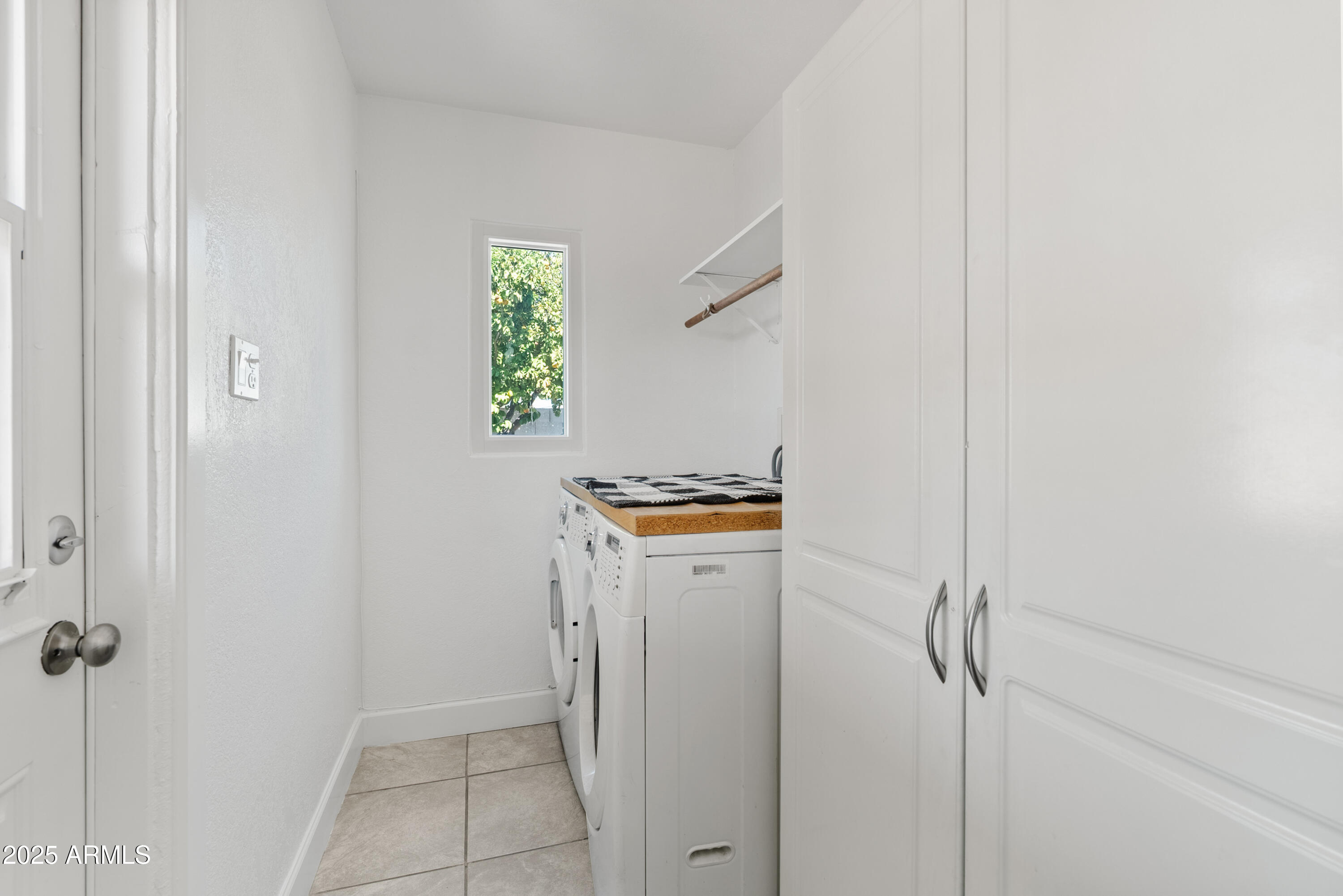 1704 West Roma Avenue Phoenix, AZ 85015 - Photo 12 of 21 a view of hallway with washer and dryer