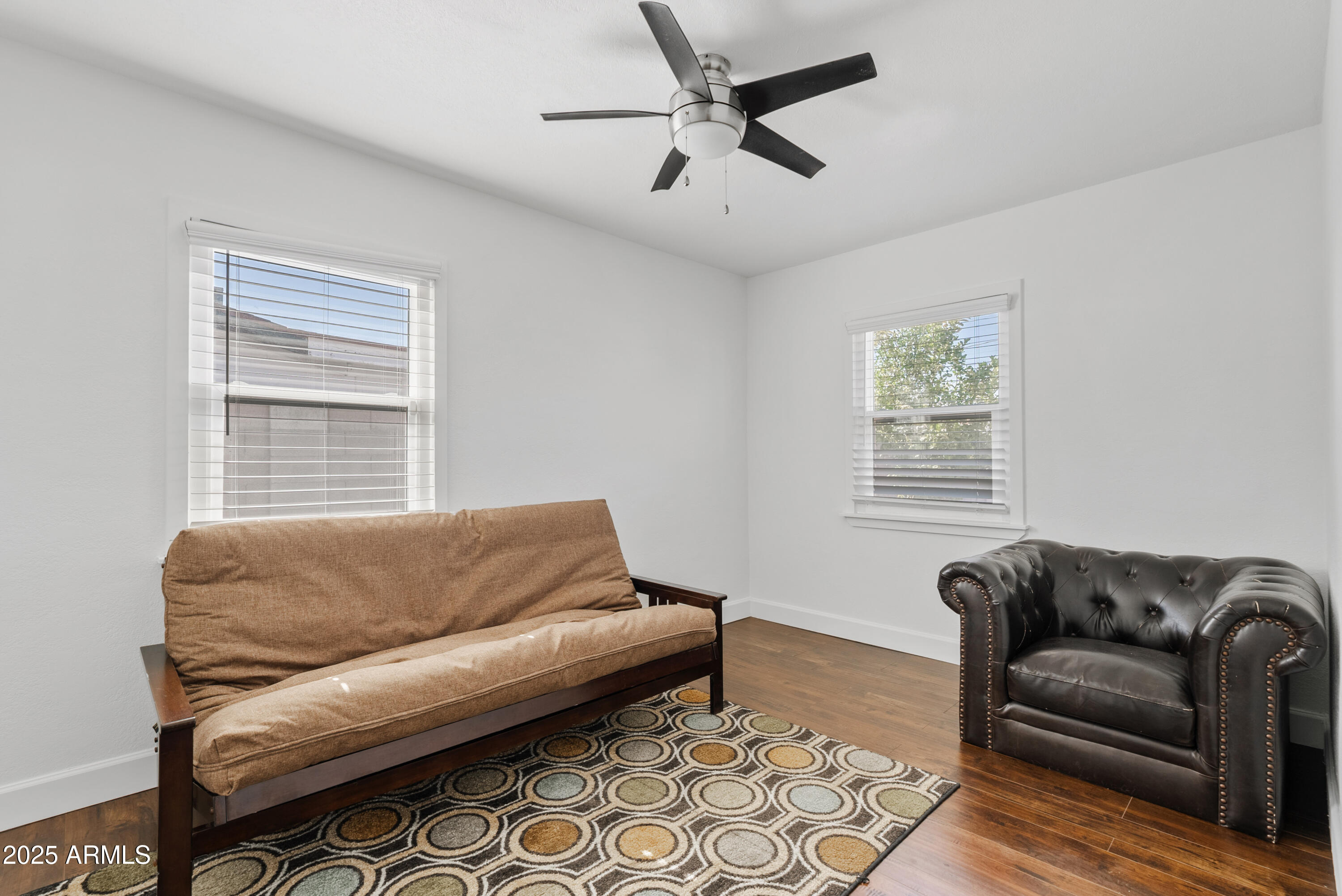 1704 West Roma Avenue Phoenix, AZ 85015 - Photo 16 of 21 a living room with furniture and a window