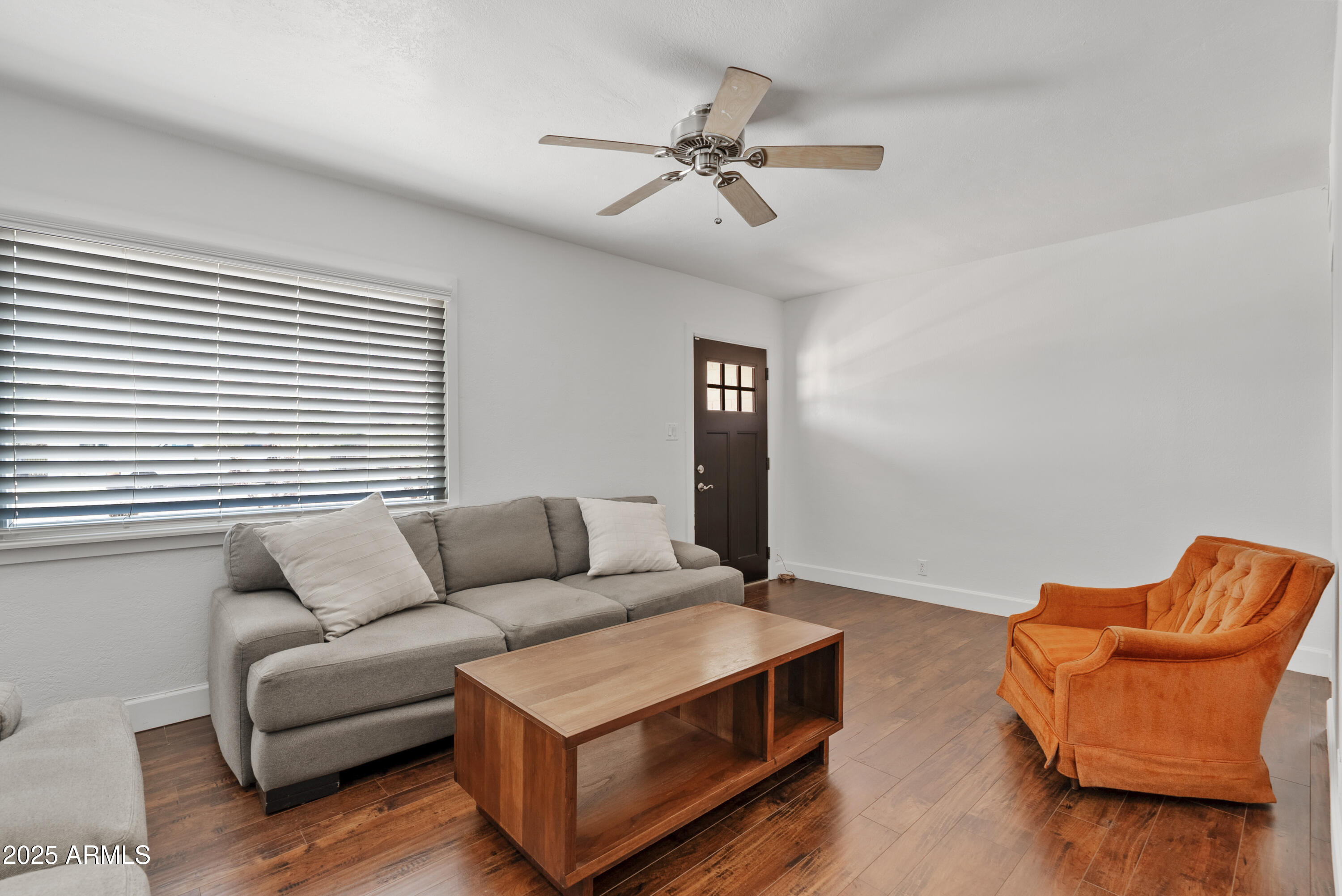 1704 West Roma Avenue Phoenix, AZ 85015 - Photo 4 of 21 a living room with furniture and a window