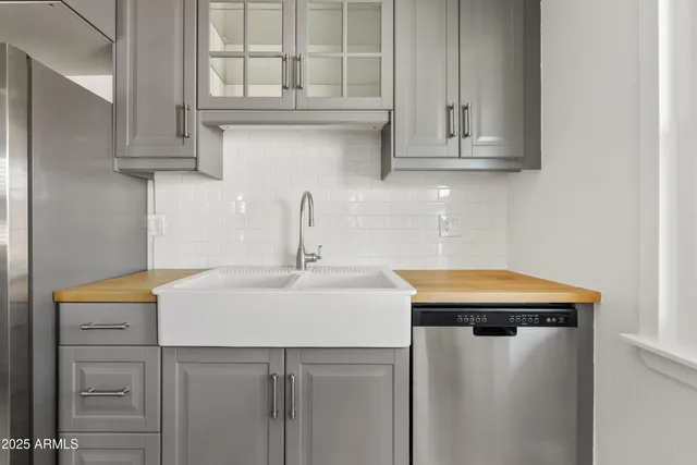 a view of a kitchen with electric appliances