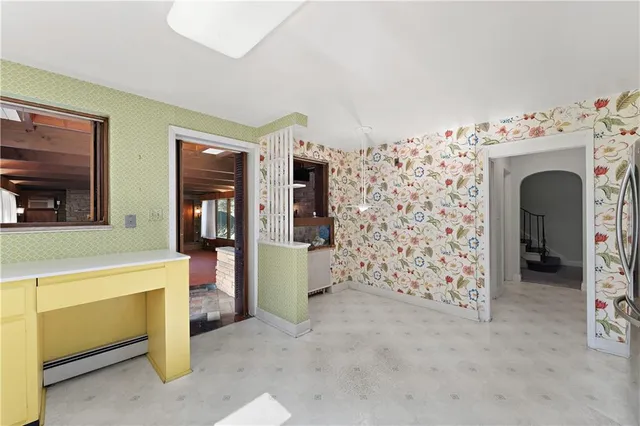 a view of livingroom with washer and dryer