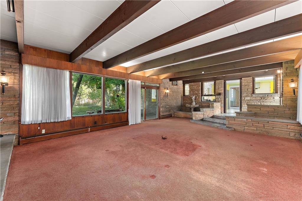 6 Churchill Road Pittsburgh, PA 15235 - Photo 13 of 42 a view of an empty room with wooden floor and a window