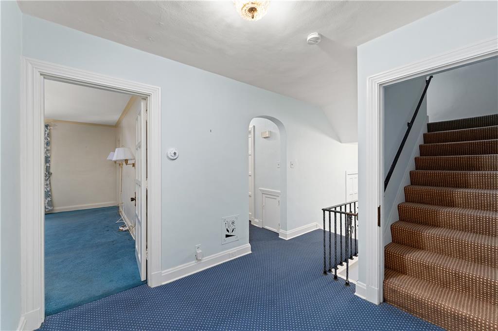 6 Churchill Road Pittsburgh, PA 15235 - Photo 19 of 42 a view of a hallway with wooden floor and entryway