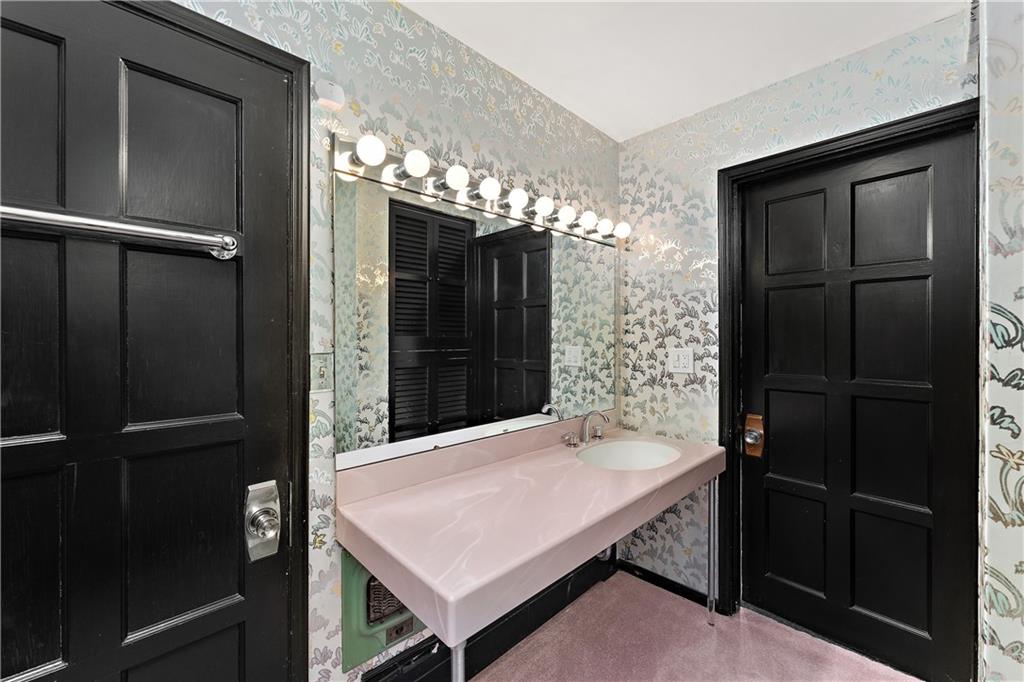 6 Churchill Road Pittsburgh, PA 15235 - Photo 30 of 42 a bathroom with a sink and a mirror