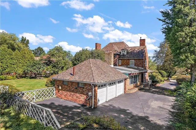 a view of yard and swimming pool