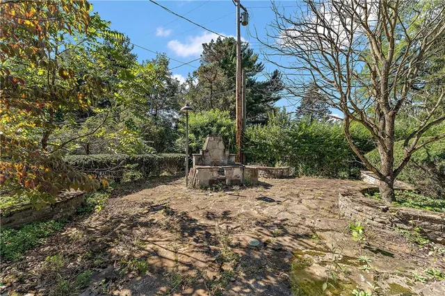 a view of a garden with a slide