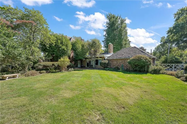 a view of a yard with an outdoor space