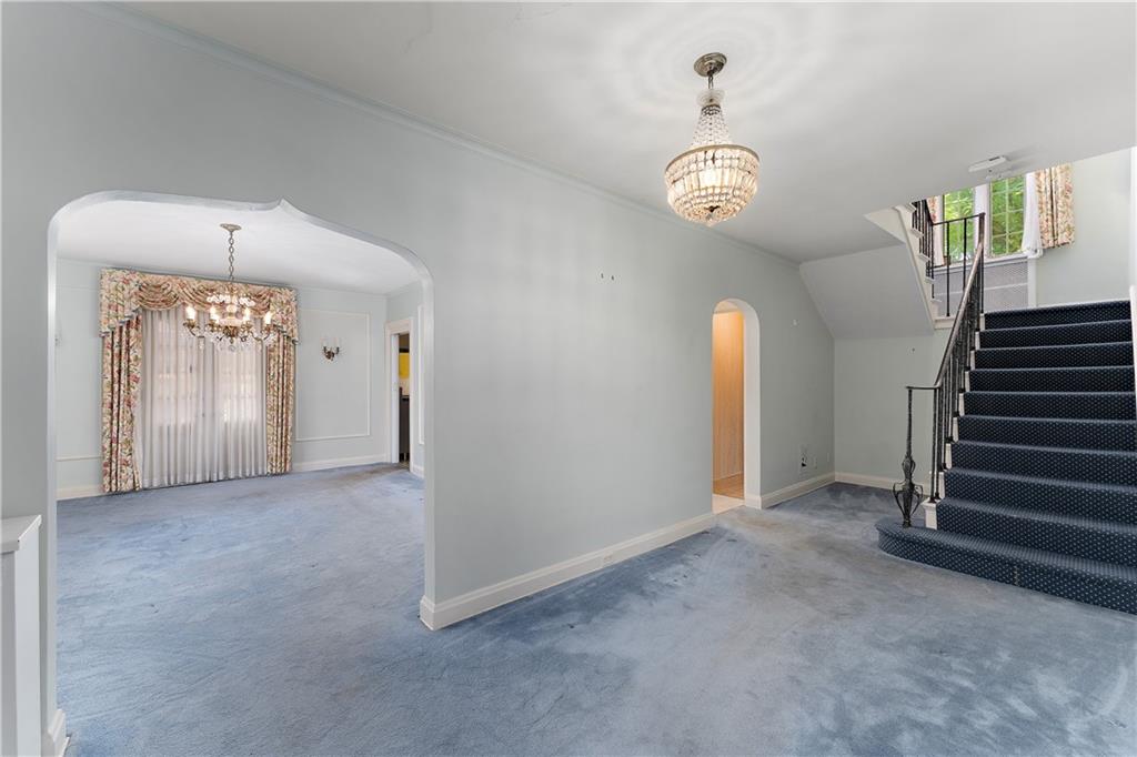 6 Churchill Road Pittsburgh, PA 15235 - Photo 7 of 42 wooden floor in an empty room with a window