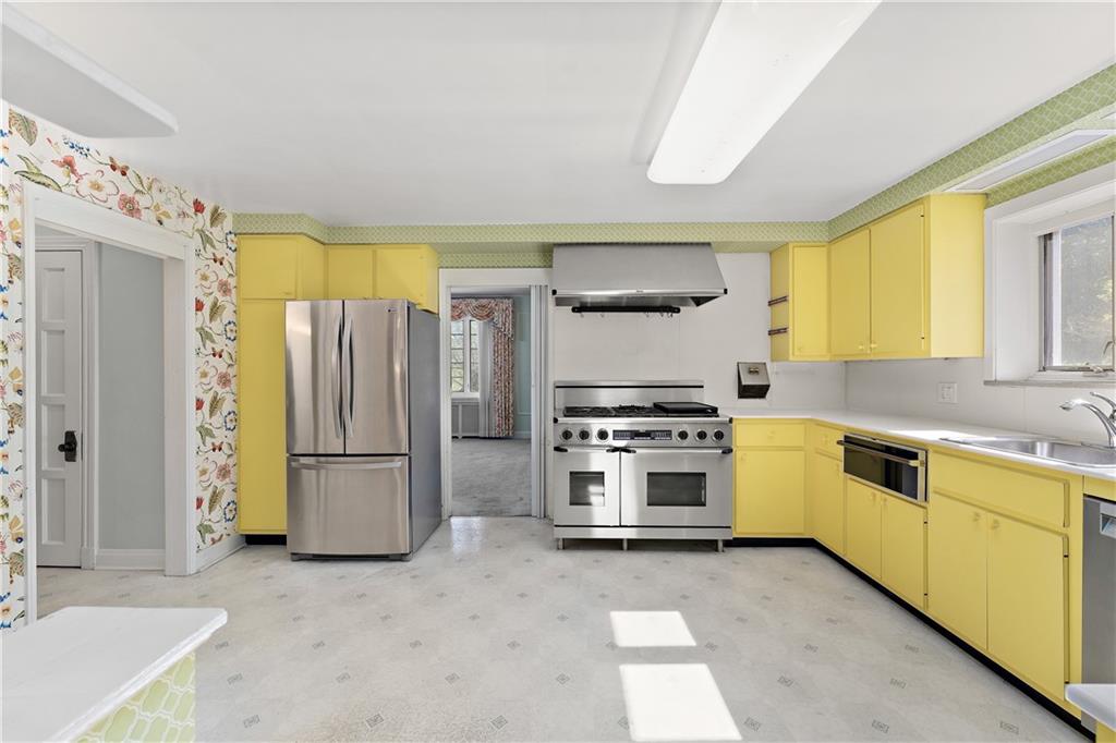 6 Churchill Road Pittsburgh, PA 15235 - Photo 10 of 42 a kitchen with appliances cabinets and a sink