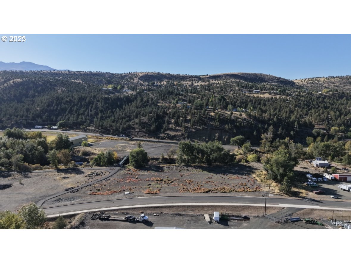 St-johnday Northeast 7th Street John Day, OR 97845 - Photo 30 of 33 a black and white photo of a field