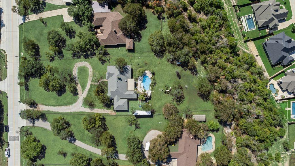 83 Crown Road Willow Park, TX 76087 - Photo 22 of 35 Expansive lot with a central residence, large swimming pool, and extensive green space