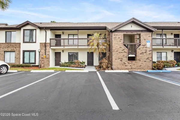 a view of a building with a street