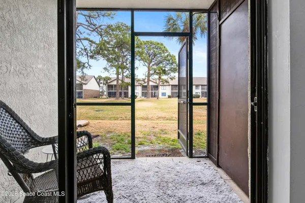 a view of an outdoor space with a large window