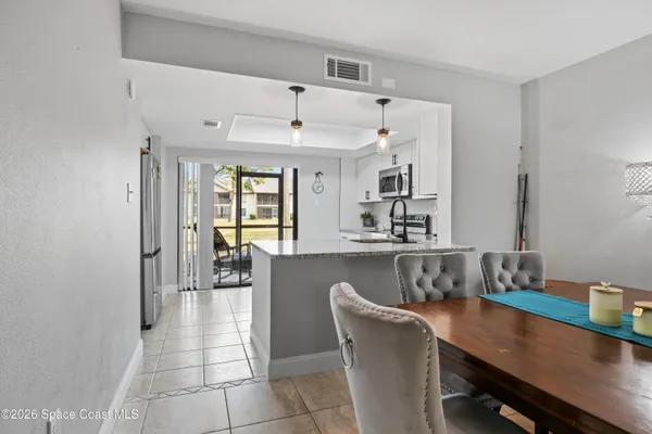 a living room with furniture and window