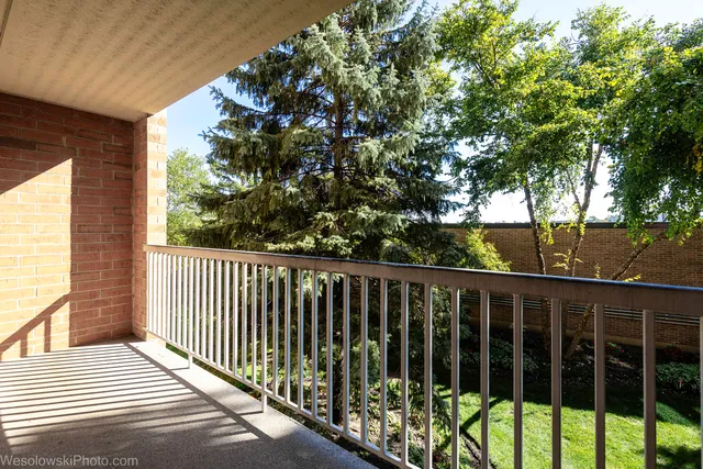 a view of a wooden roof deck