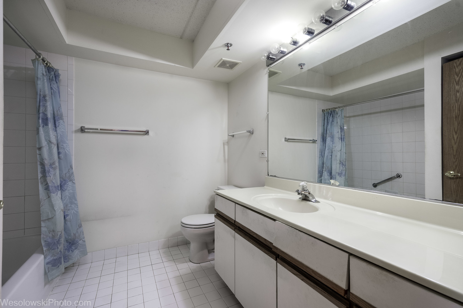 7450 Waukegan Road, Unit 206 Niles, IL 60714 - Photo 22 of 26 a bathroom with a sink a toilet and shower