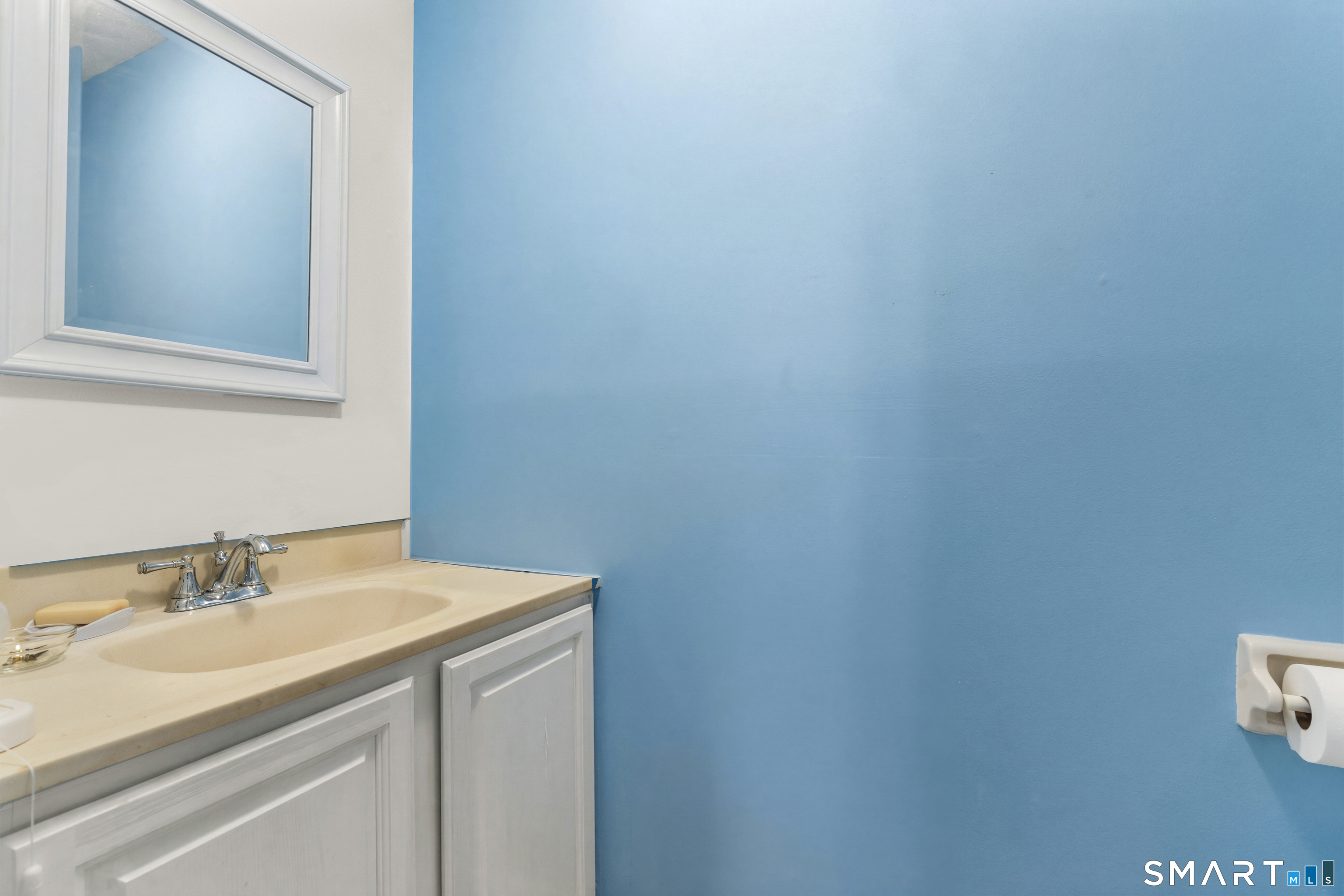 3 MacIntosh Lane, Unit 3 Ansonia, CT 06401 - Photo 18 of 34 a bathroom with a sink and a mirror