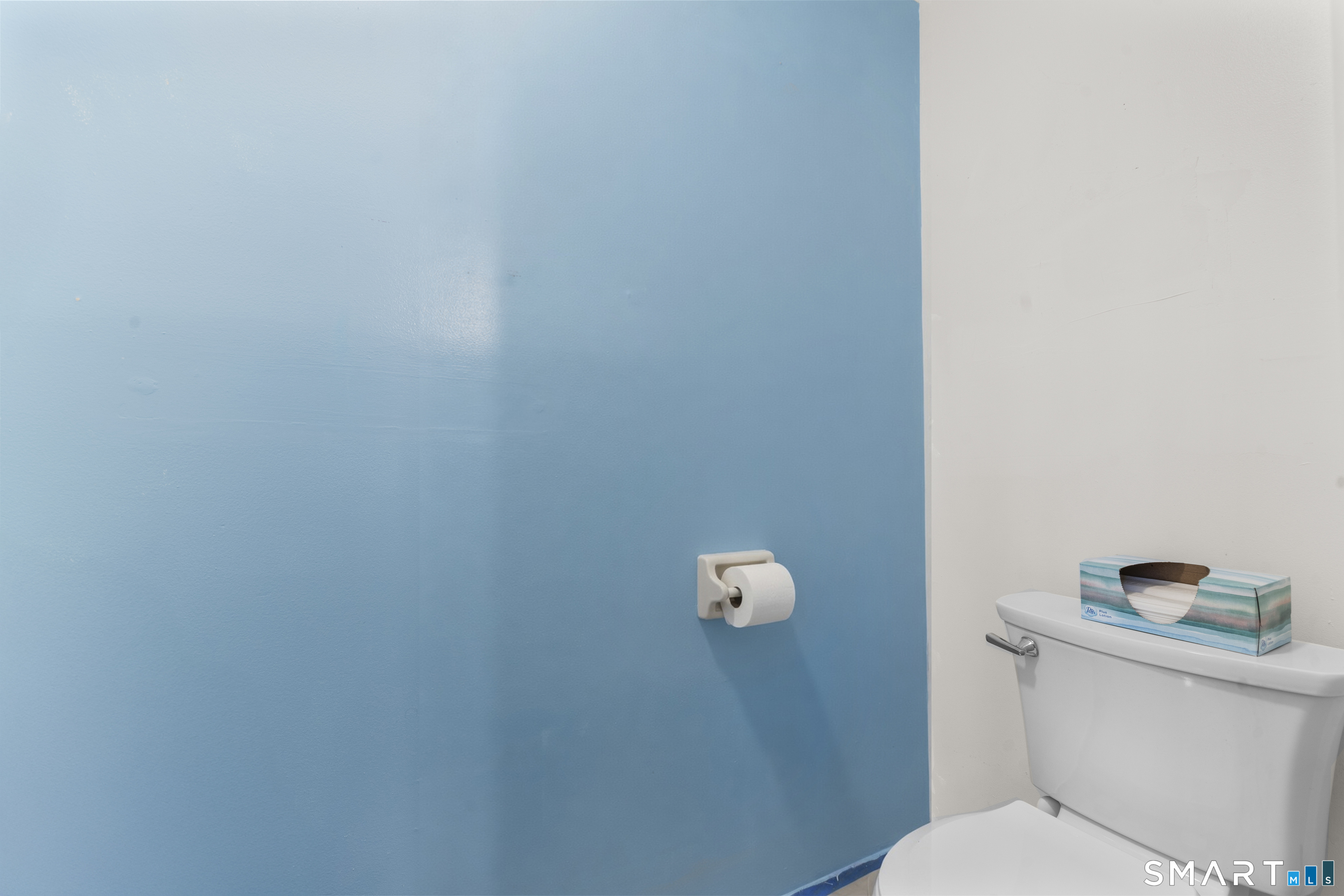3 MacIntosh Lane, Unit 3 Ansonia, CT 06401 - Photo 19 of 34 a white toilet sitting next to a white wall