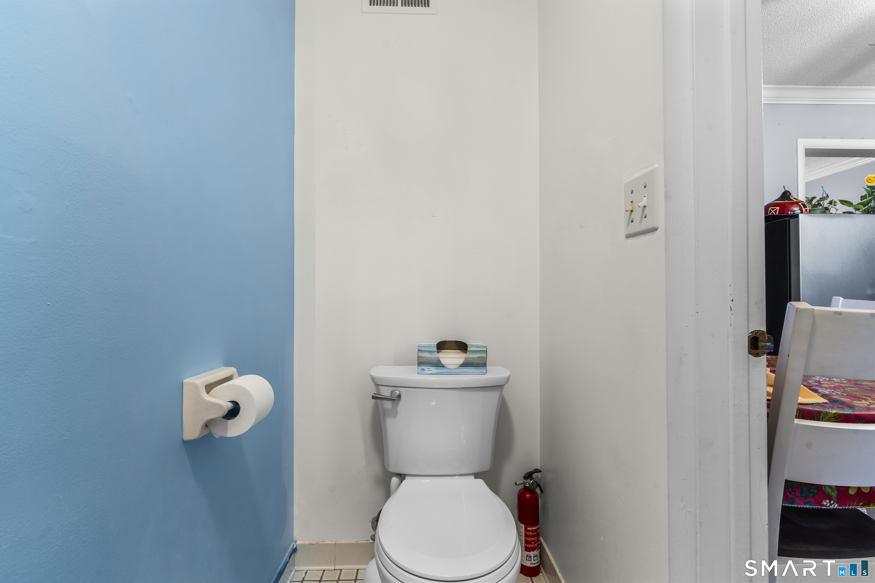 3 MacIntosh Lane, Unit 3 Ansonia, CT 06401 - Photo 20 of 34 a white toilet sitting next to a bathroom sink