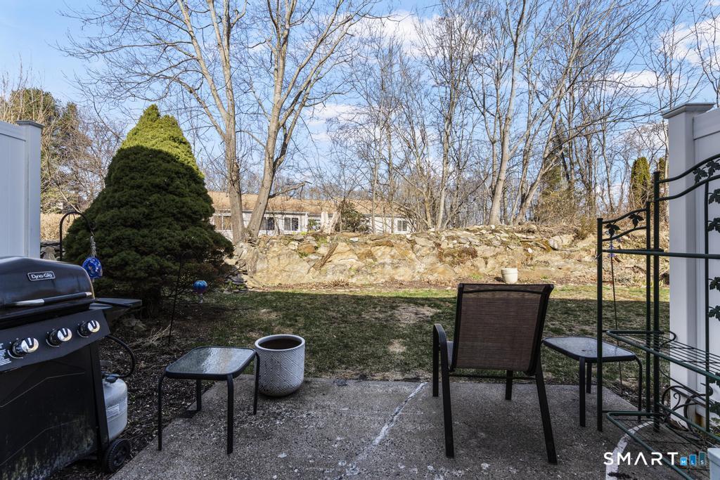 3 MacIntosh Lane, Unit 3 Ansonia, CT 06401 - Photo 30 of 34 a view of a backyard with sitting area