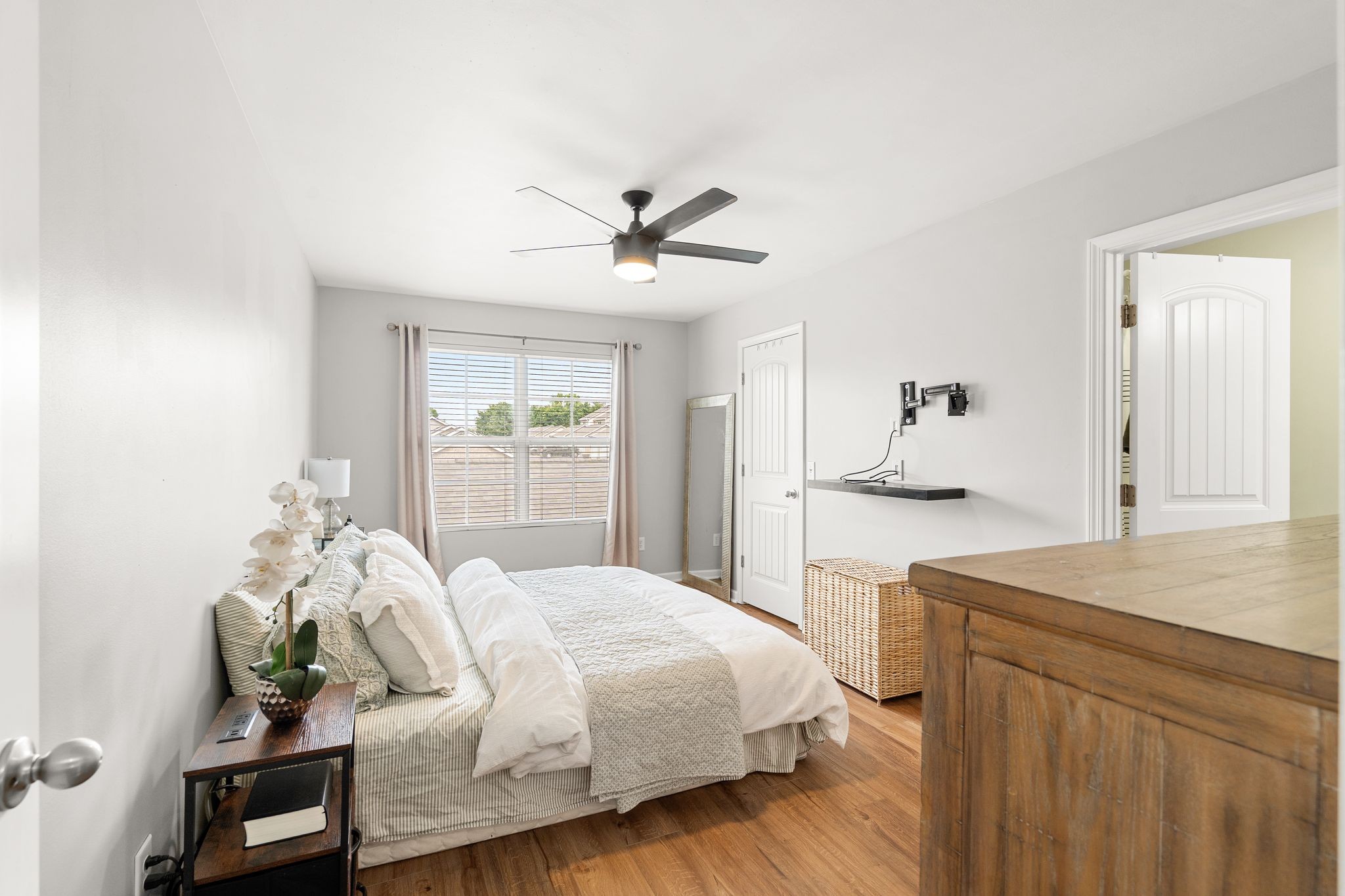 1908 Boxelder Alley Hermitage, TN 37076 - Photo 15 of 31 a bedroom with a bed and a chandelier