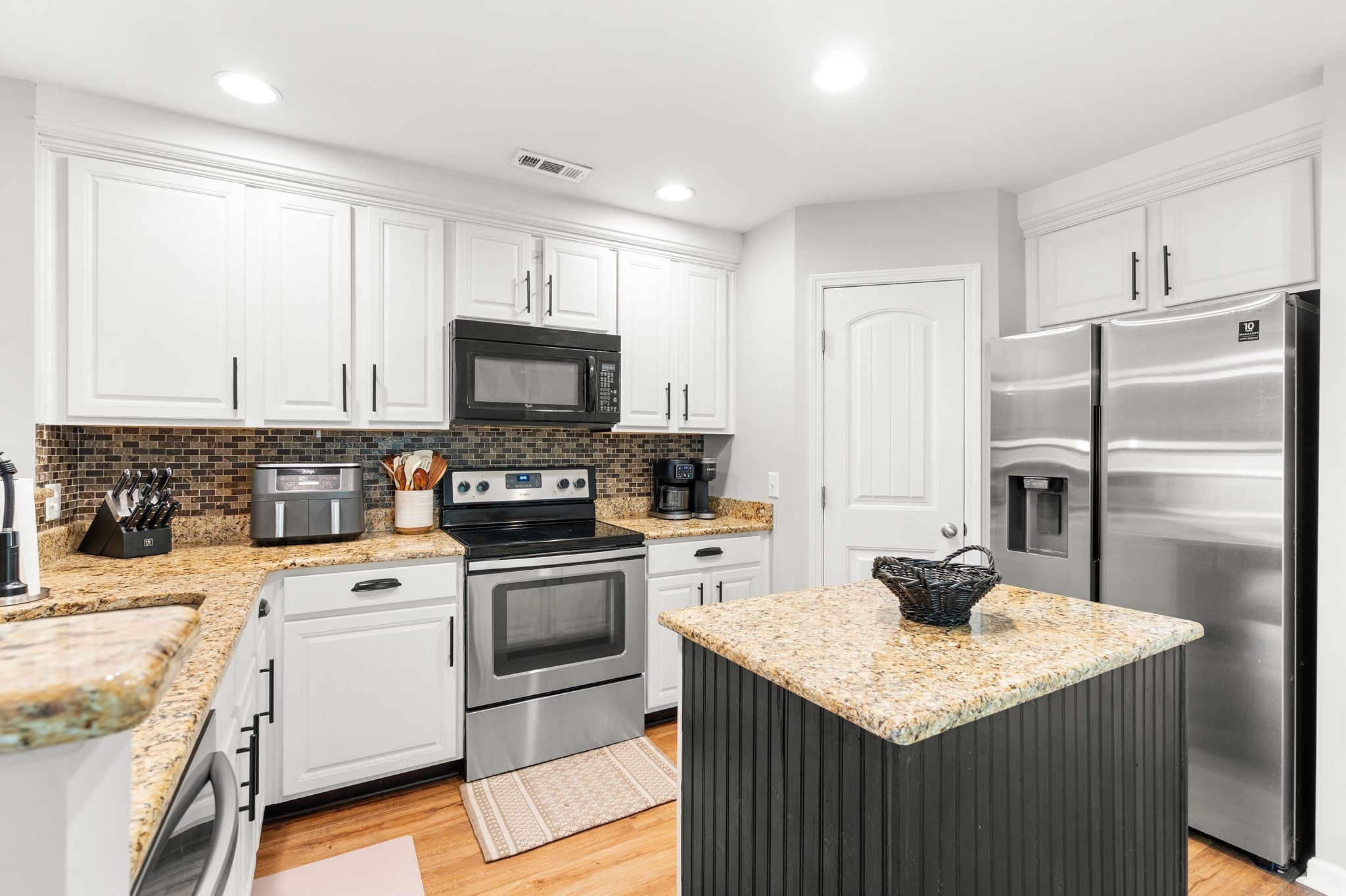 1908 Boxelder Alley Hermitage, TN 37076 - Photo 2 of 31 a kitchen with a sink stove and refrigerator
