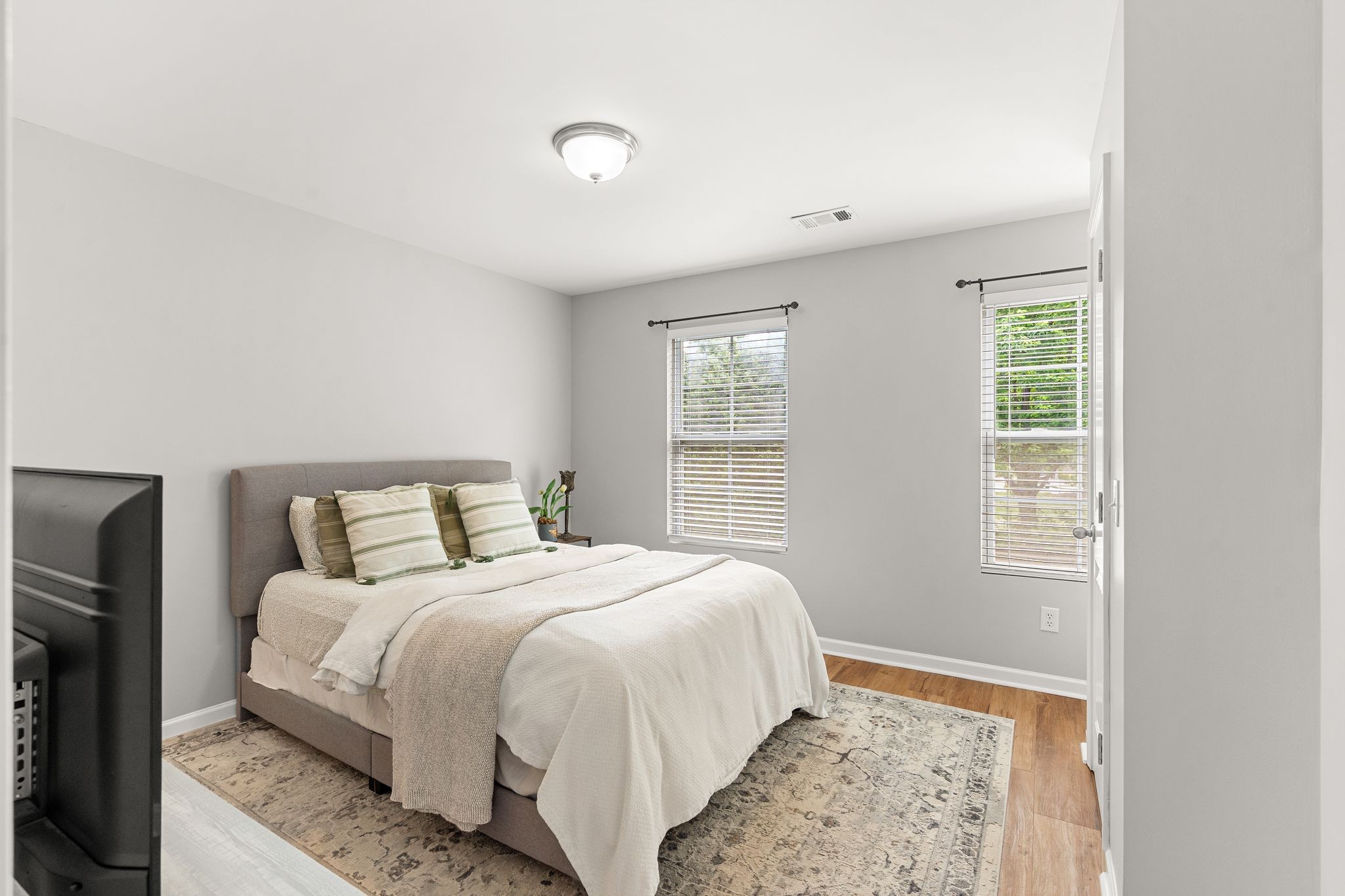1908 Boxelder Alley Hermitage, TN 37076 - Photo 21 of 31 a bedroom with a bed and a window