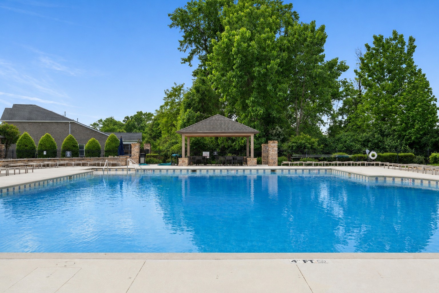 1908 Boxelder Alley Hermitage, TN 37076 - Photo 30 of 31 a view of a swimming pool with lawn chairs under an umbrella