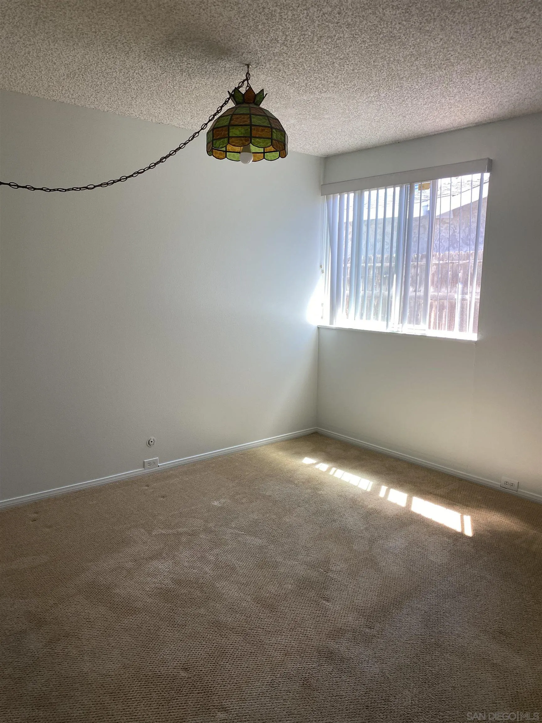 748 Ellen Lane El Cajon, CA 92019 - Photo 11 of 15 a view of an empty room with a window