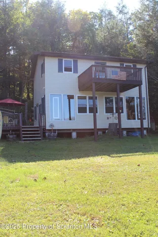 a view of a house with swimming pool