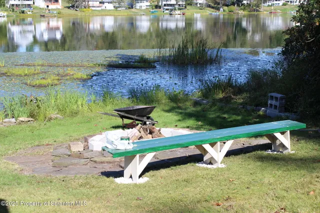 a garden view with a lake view