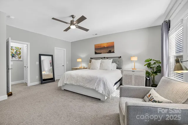 a bathroom with a tub sink and shower