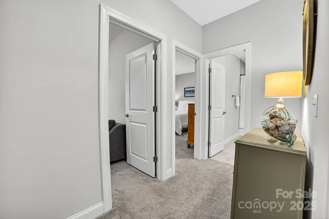 a bedroom with a bed and a television